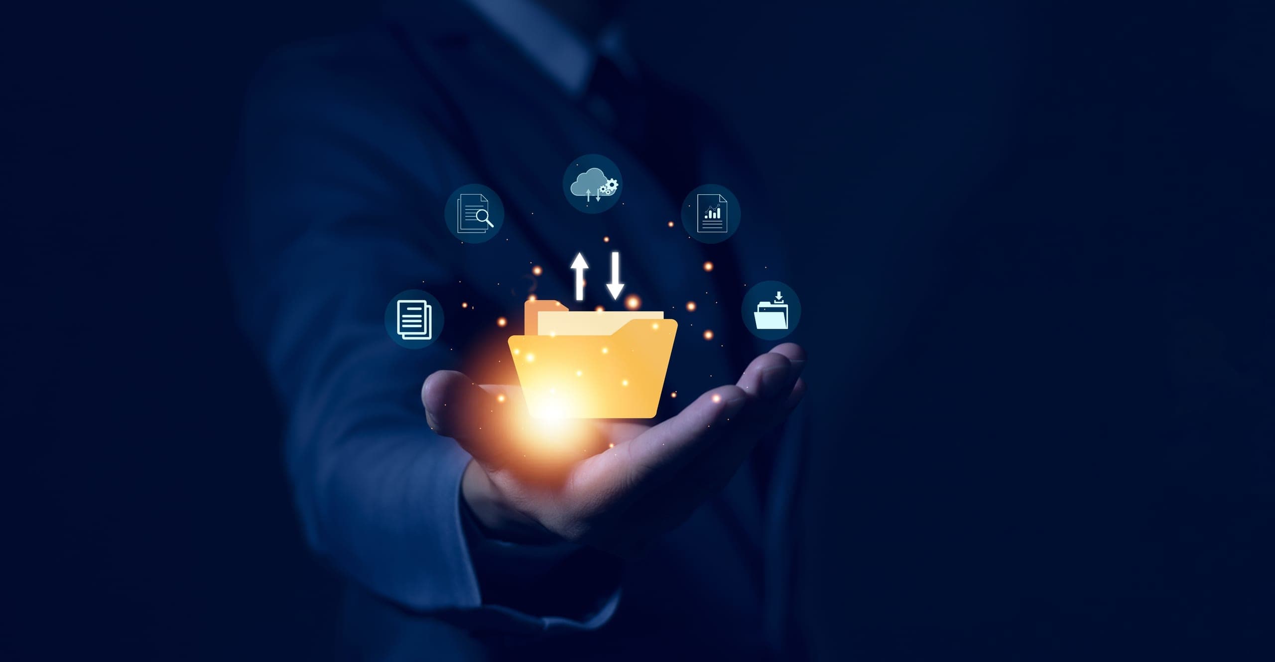 A person in a suit holds out their hand with a glowing digital folder surrounded by data and network-related icons.