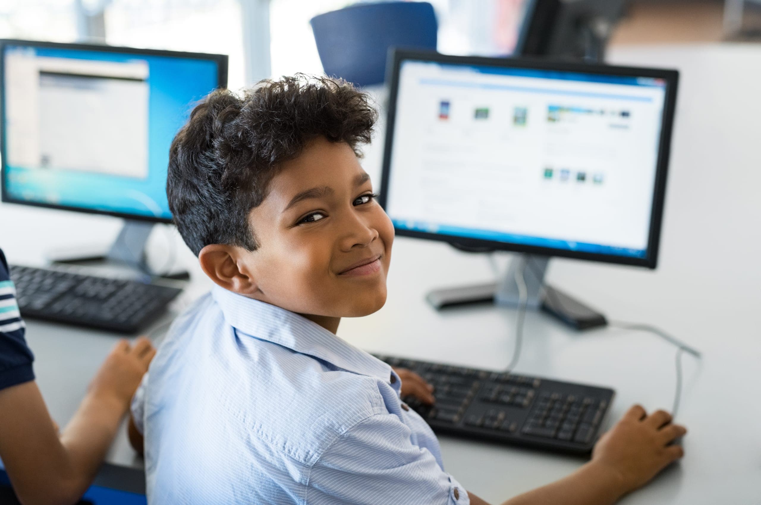 Student-looking-up-from-computer